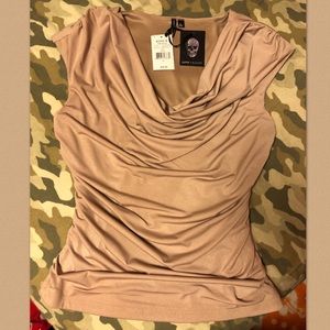 Glitter, sparkle, swoop neck, cut off style shirt.